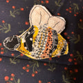 Honeybee slow-stitched pin - colorful patchwork fabric bee