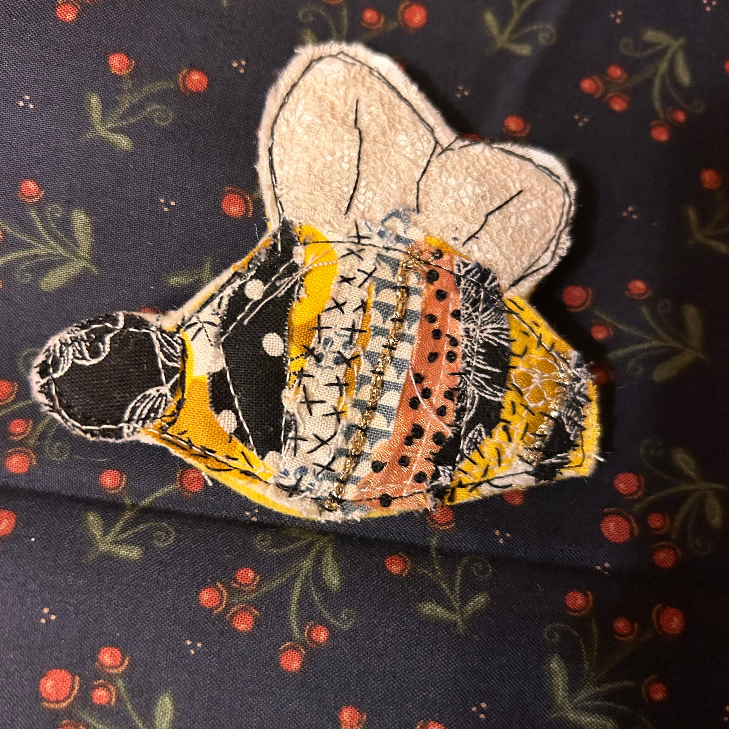 Honeybee slow-stitched pin - colorful patchwork fabric bee