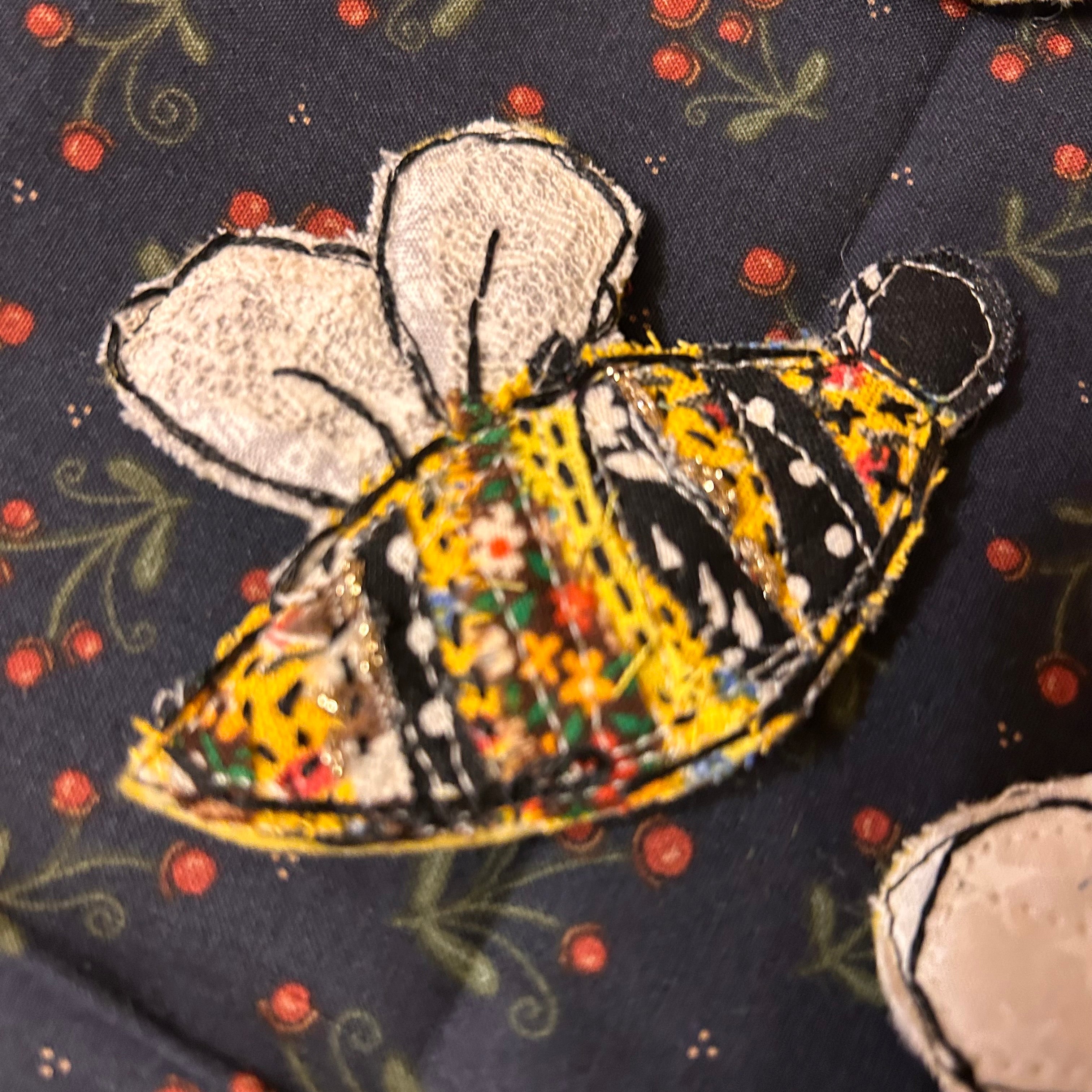 Honeybee slow-stitched pin - cream and black fabric bee